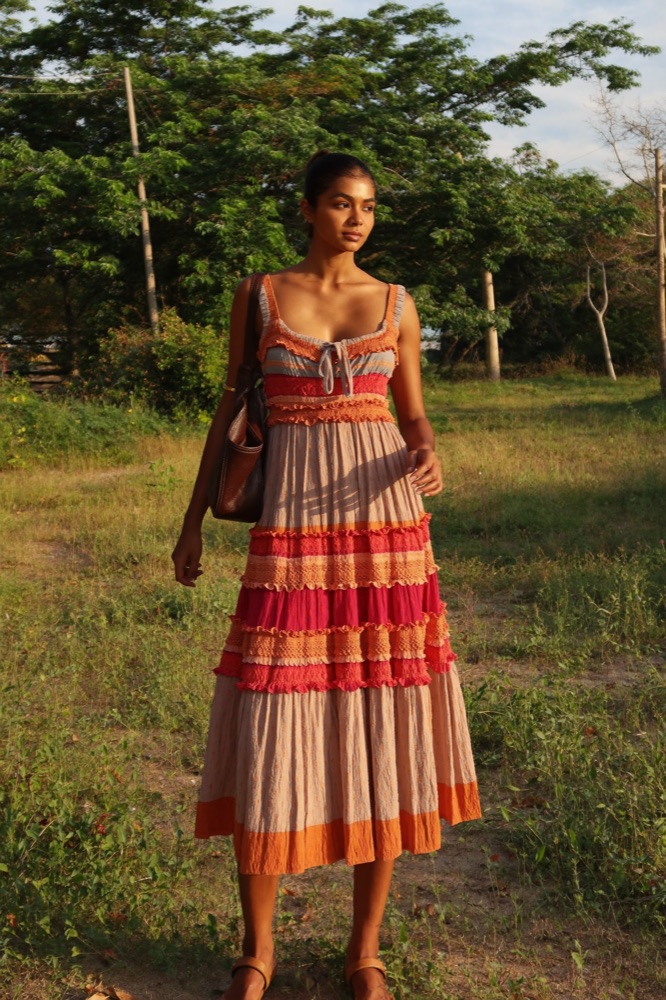 Campaign-style on-model fashion photograph